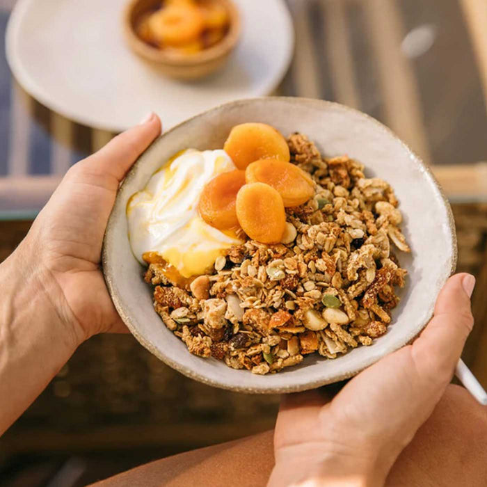 Brookfarm Toasted Muesli Macadamia Apricot Coconut in Bowl with dried apricots & yoghurt