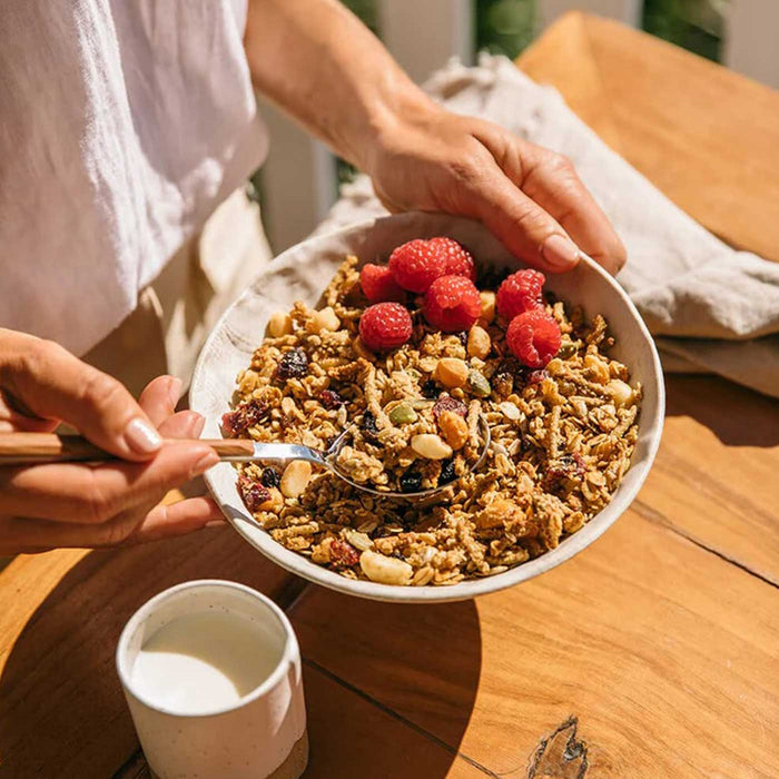 Brookfarm Toasted Muesli Macadamia Apricot Coconut Bowl with Raspberries